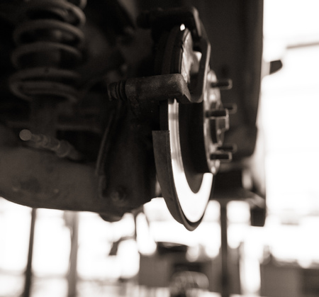 Repair of brake system on car wheels .の写真素材