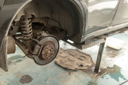 Repair of brake system on car wheels .の写真素材