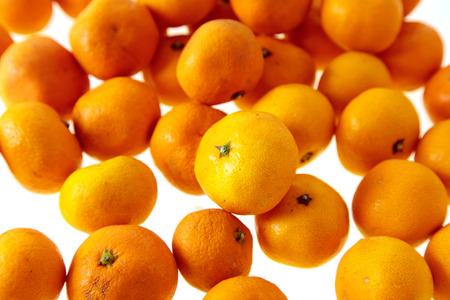 Mandarins isolated on white background .