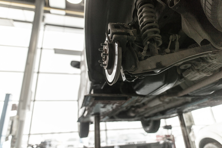 Repair of brake system on car wheels .の写真素材