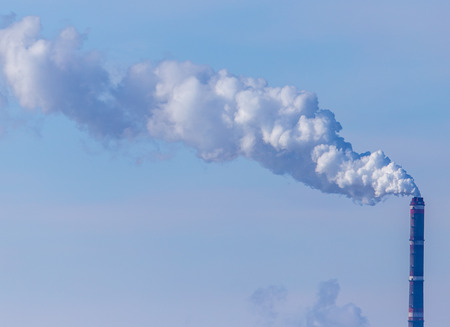 Industrial smoke against the sky .