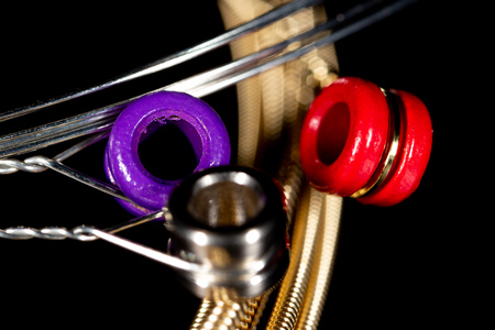 Strings for guitar on a black background. Macroの写真素材