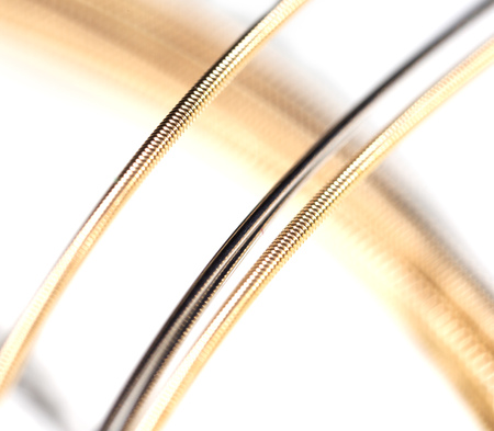 Strings for guitar isolated on a white background. Macroの写真素材