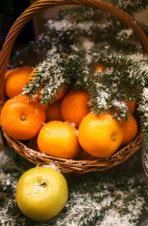 Basket with tangerines on a shop window .の写真素材