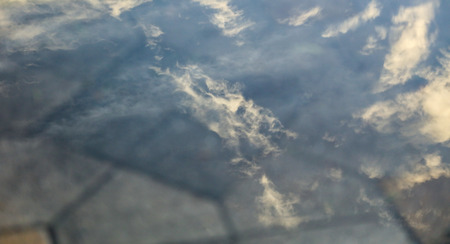 Puddle on the road with reflection .の写真素材