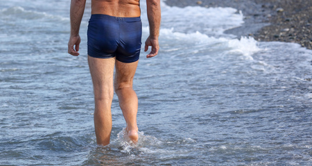 Man swims on the sea .の写真素材