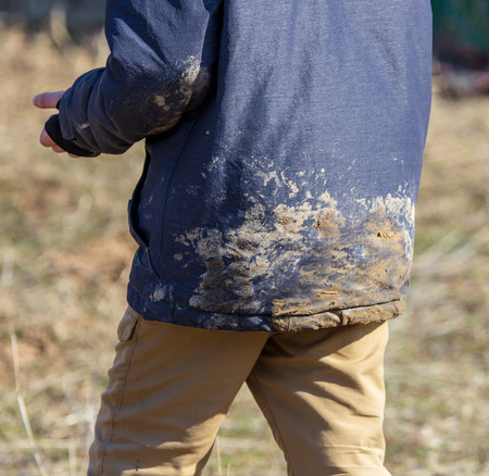 Dirt on the jacket of the boy .の写真素材