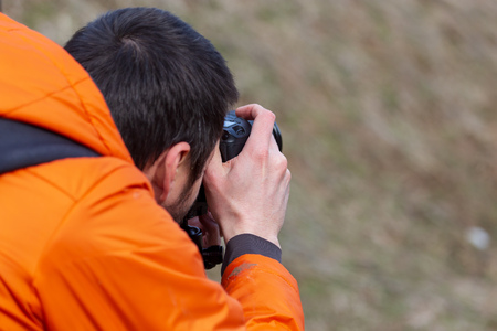 Man taking pictures in nature .の写真素材