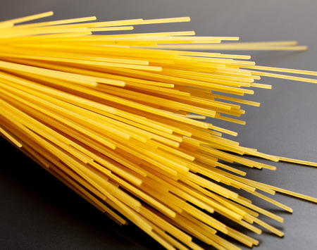 Pasta from dough as an abstract background .の写真素材