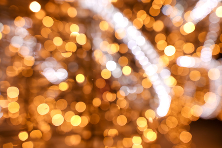 Golden bokeh lights as abstract background. Texture