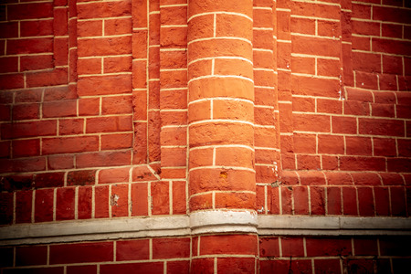 Red brick wall as abstract background .