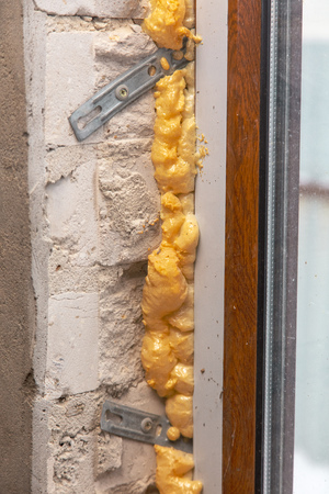 Foam in the wall at a construction site .の写真素材
