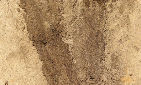 Stucco on the wall of the house as an abstract background.