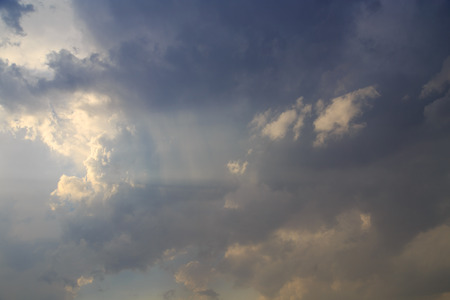 Clouds after rain before sunset as a background .