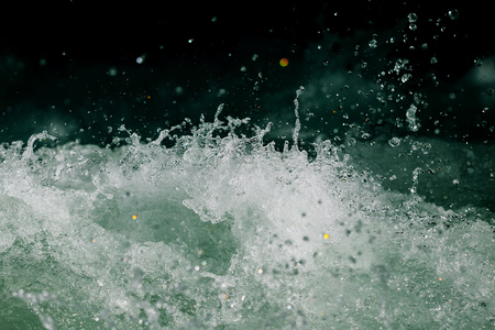 Splashes of water from the waves in the sea .の写真素材