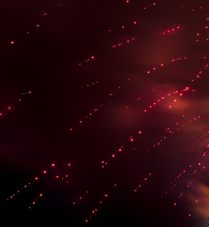 Beautiful sparks from fireworks in the sky at night.の写真素材