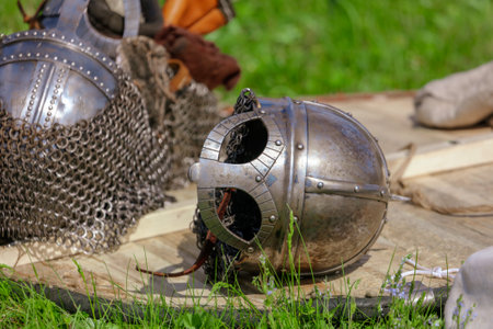 Yelets, Russia - May 11, 2019: Armor of knights lie on the grass. Historical holiday Rusborg.のeditorial素材