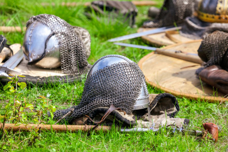 Yelets, Russia - May 11, 2019: Armor of knights lie on the grass. Historical holiday Rusborg.のeditorial素材