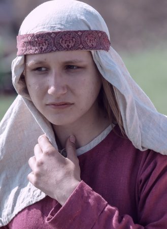 Yelets, Russia - May 11, 2019: Girl in the clothes of ancient Russian people. Historical holiday Rusborg.のeditorial素材