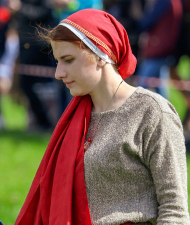 Yelets, Russia - May 11, 2019: Girl in the clothes of ancient Russian people. Historical holiday Rusborg.のeditorial素材