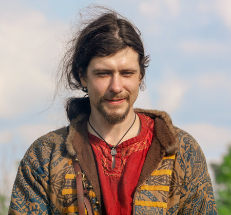 Yelets, Russia - May 11, 2019: A man in antique clothes. Historical holiday Rusborg.のeditorial素材