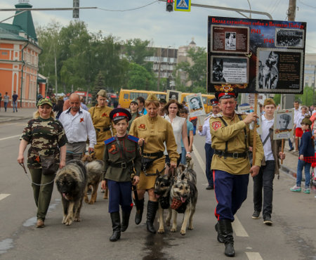 Lipetsk, Russia - May 9, 2019: Action Immortal Regiment. People go with dogs .のeditorial素材