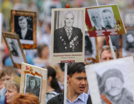 Lipetsk, Russia - May 9, 2019: Action Immortal Regiment. People come with photos of the military in World War II.のeditorial素材