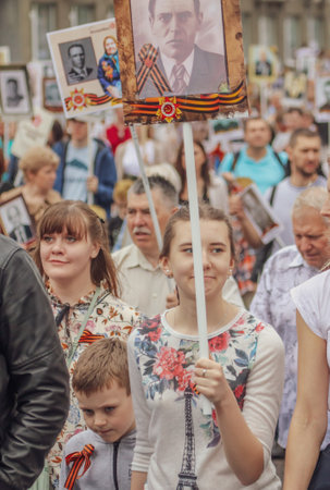 Lipetsk, Russia - May 9, 2019: Action Immortal Regiment. People come with photos of the military in World War II.のeditorial素材