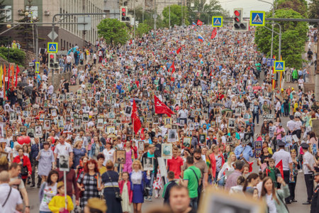 Lipetsk, Russia - May 9, 2019: Action Immortal Regiment. People come with photos of the military in World War II.のeditorial素材