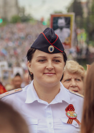 Lipetsk, Russia - May 9, 2019: Action Immortal Regiment. People come with photos of the military in World War II.のeditorial素材