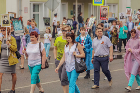 Lipetsk, Russia - May 9, 2019: Action Immortal Regiment. People come with photos of the military in World War II.のeditorial素材