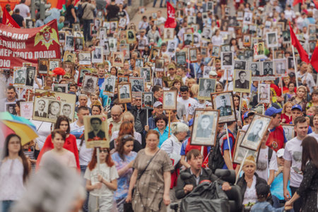 Lipetsk, Russia - May 9, 2019: Action Immortal Regiment. People come with photos of the military in World War II.のeditorial素材