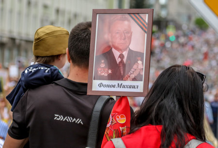 Lipetsk, Russia - May 9, 2019: Action Immortal Regiment. People come with photos of the military in World War II.のeditorial素材