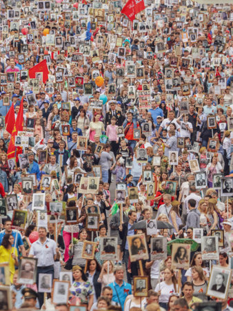 Lipetsk, Russia - May 9, 2019: Action Immortal Regiment. People come with photos of the military in World War II.のeditorial素材