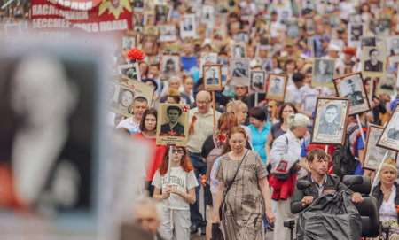 Lipetsk, Russia - May 9, 2019: Action Immortal Regiment. People come with photos of the military in...