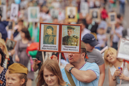 Lipetsk, Russia - May 9, 2019: Action Immortal Regiment. People come with photos of the military in World War II.のeditorial素材