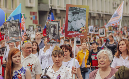 Lipetsk, Russia - May 9, 2019: Action Immortal Regiment. People come with photos of the military in World War II.のeditorial素材
