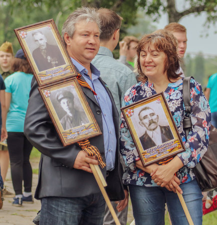 Lipetsk, Russia - May 9, 2019: Action Immortal Regiment. People come with photos of the military in World War II.のeditorial素材