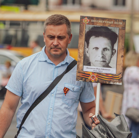 Lipetsk, Russia - May 9, 2019: Action Immortal Regiment. People come with photos of the military in World War II.のeditorial素材
