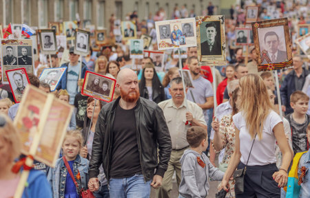 Lipetsk, Russia - May 9, 2019: Action Immortal Regiment. People come with photos of the military in World War II.のeditorial素材