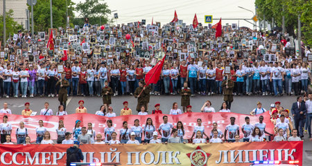 Lipetsk, Russia - May 9, 2019: Action Immortal Regiment. People come with photos of the military in World War II.のeditorial素材