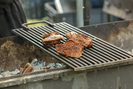 Grilled meat on the grill .の写真素材
