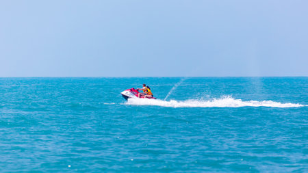 Sochi, Russia - June 4, 2019: People ride on a water bike in the Black Sea .のeditorial素材