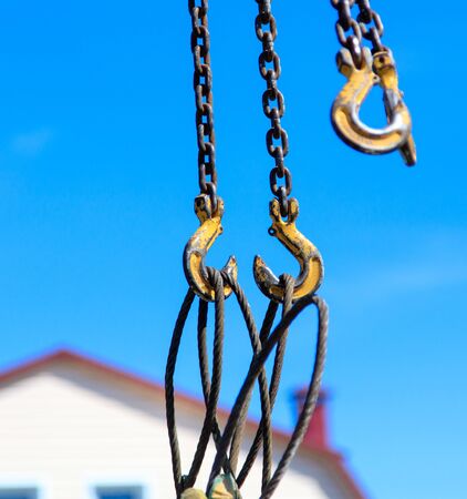 Cables on the crane against the sky .の写真素材