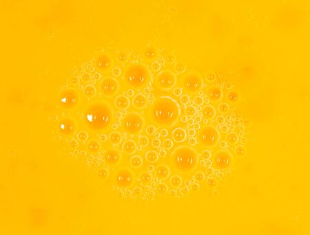 Whipped yolk with eggs as an abstract background. Macroの写真素材