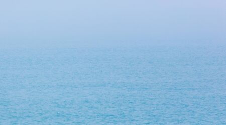Expanse of water on the sea with a foggy horizon .の写真素材