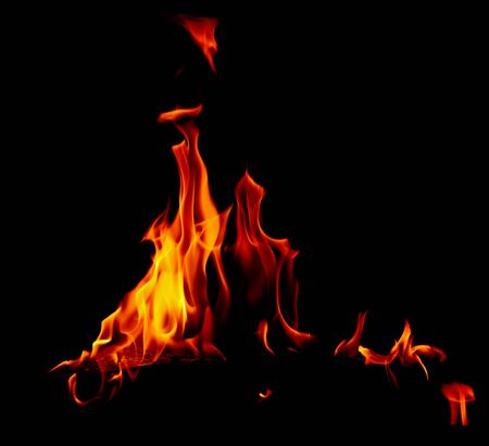 Flame of fire on a black background .