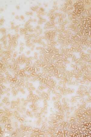 Yeast in dough as background. Macro