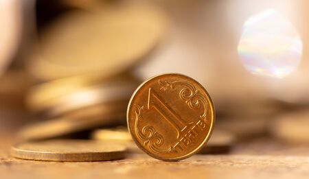 Coin one tenge on the table. Macroの写真素材