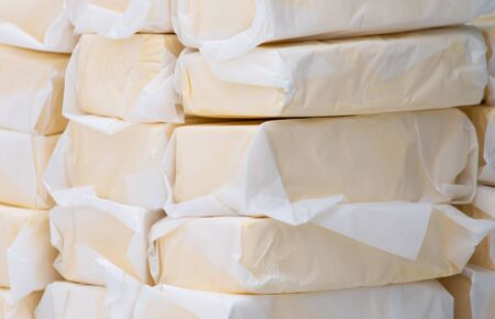 Paper wrapped butter in the market.の写真素材